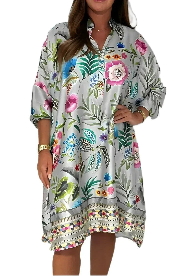 Loose dress with V-neck and half button placket with floral pattern