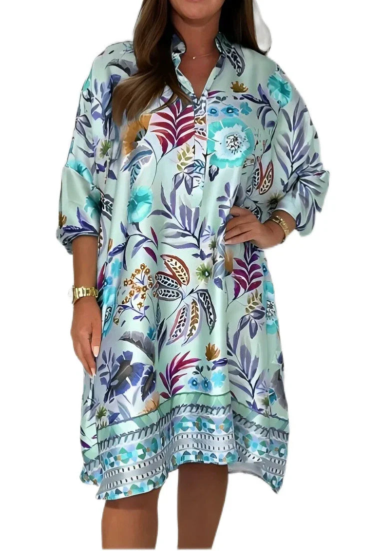 Loose dress with V-neck and half button placket with floral pattern