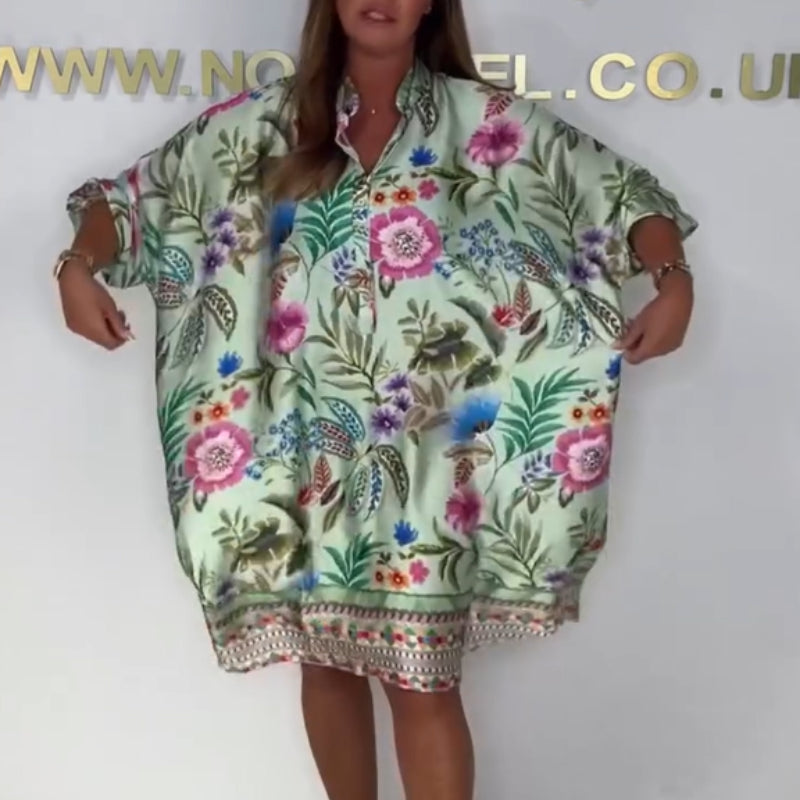 Loose dress with V-neck and half button placket with floral pattern