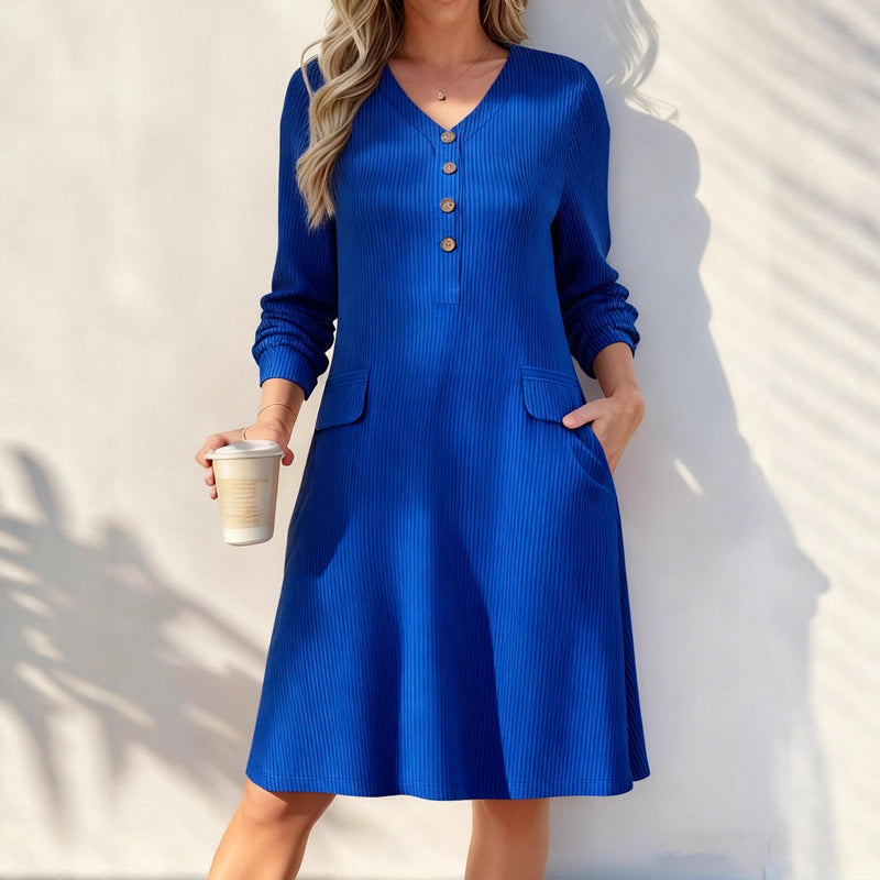 A Lovely V-Neck Ribbed Knit Dress with a Flattering A-Line Shape and Just the Right Touch of Elegance