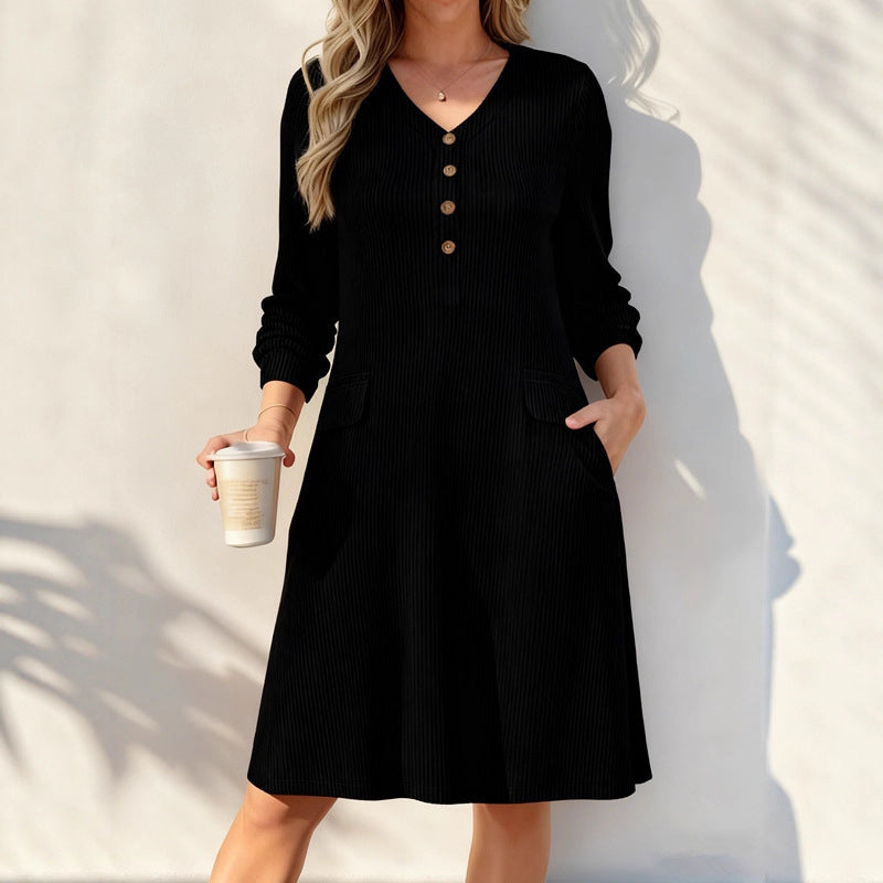 A Lovely V-Neck Ribbed Knit Dress with a Flattering A-Line Shape and Just the Right Touch of Elegance