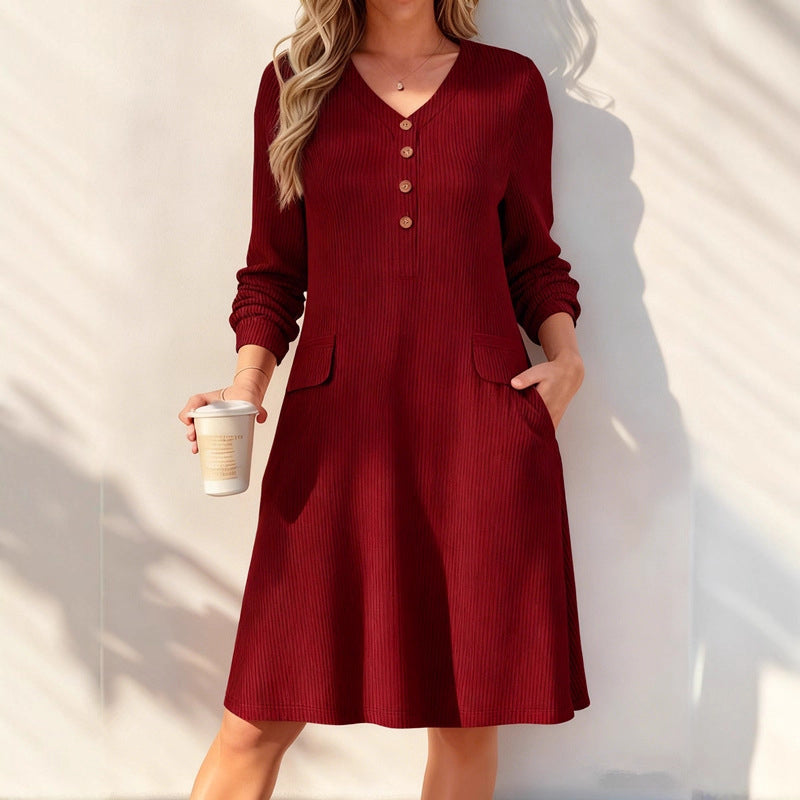 A Lovely V-Neck Ribbed Knit Dress with a Flattering A-Line Shape and Just the Right Touch of Elegance
