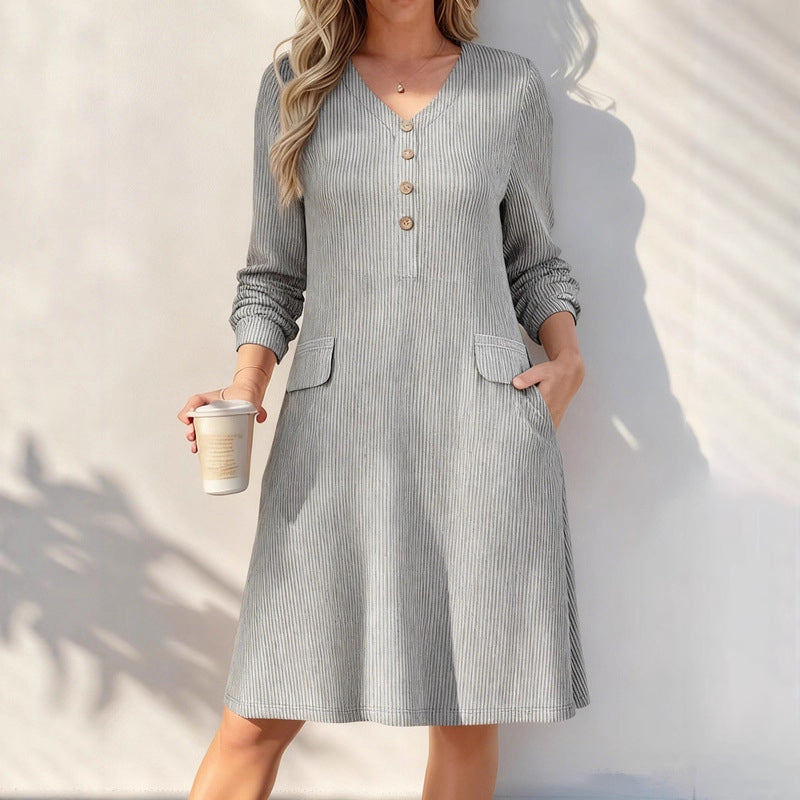 A Lovely V-Neck Ribbed Knit Dress with a Flattering A-Line Shape and Just the Right Touch of Elegance